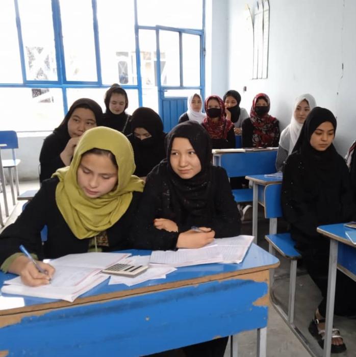 Girls take classes in Afghanistan.